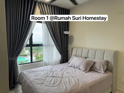 a bedroom with a bed and a window with a view at Rumah Suri Homestay at Arena2 Residence Kota Warisan in Sepang