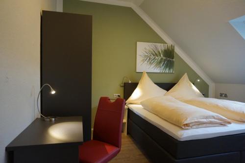 Giường trong phòng chung tại Hotel-Restaurant Große-Wilde