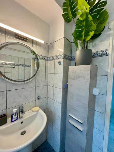 a bathroom with a sink and a mirror at Villa Panorama Sea View Family Villa near Vrachos Beach Lygia in Ligia