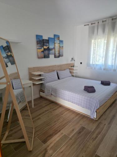 a bedroom with a bed and a ladder in it at Chalet Sol Park in Cambrils