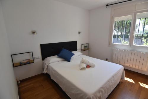 Empuriabrava Byblos Acogedora casa con jardín privado y piscina comunitaria en Empuriabrava Costa Brava