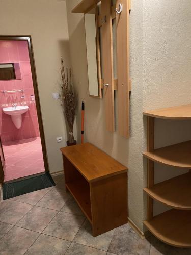 a bathroom with a sink and a toilet at Вила Шишарка in Govedartsi