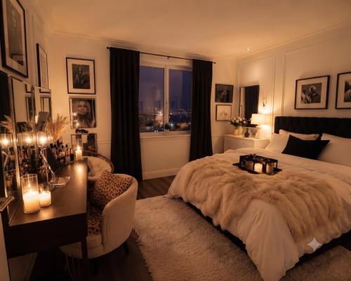 a bedroom with a bed and a desk and a window at Luxury apartment With 3 Ac and Free Parking in Lahore