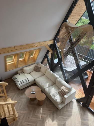 an overhead view of a living room with a couch at Noora Nook in Sadu