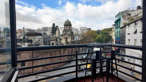 a view of a city from a balcony at MONS hostel in Buenos Aires