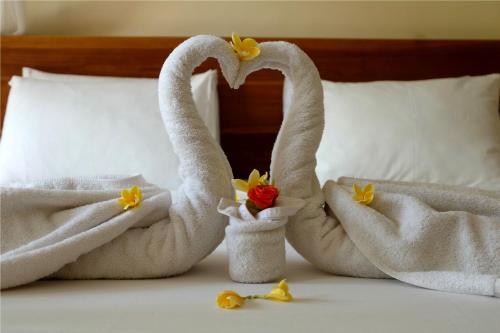 Ένα ή περισσότερα κρεβάτια σε δωμάτιο στο Eka Bali Guest House