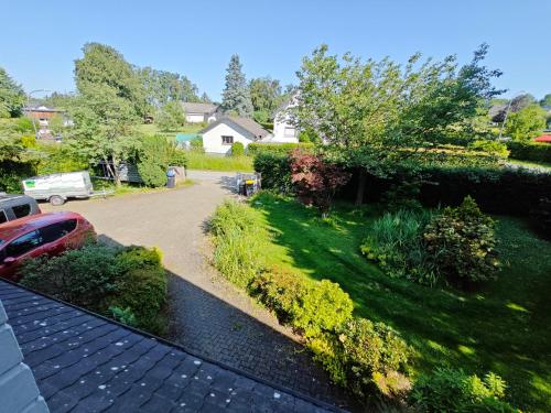 a view of a yard with a driveway at Büchelblick Camping in Monschau