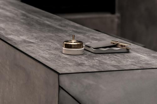 a metal object sitting on top of a table at Hotel Hart in Hong Kong