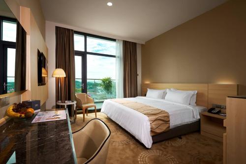 En eller flere senger på et rom på Purest Hotel Sungai Petani