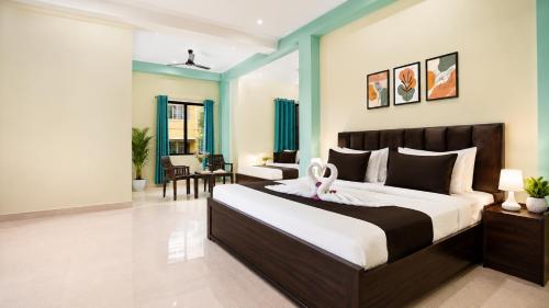 a bedroom with a large bed in a room at Rudraksh Residency in Varanasi