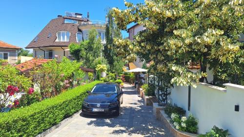 a car parked on the side of a street at Dimana in Chernomorets