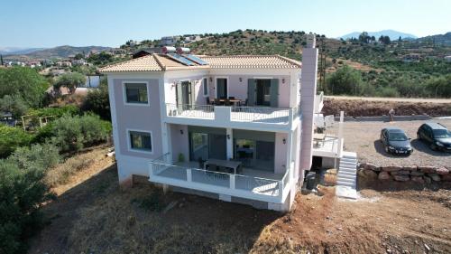 an aerial view of a white house at VILLA GALINI NAFPLIO with Panoramic View I in Nafplio