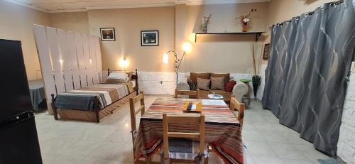 a living room with a couch and a table at Terraza del Rio in Formosa