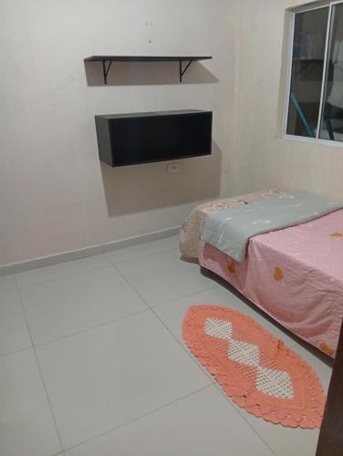 Quarto em edícula com banheiro espaço privativo