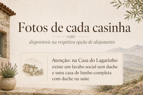 a sign for a building with a mountain in the background at Casas Serranas in Gouveia