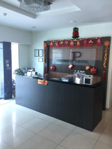 Kuchyň nebo kuchyňský kout v ubytování Premierz Hotel