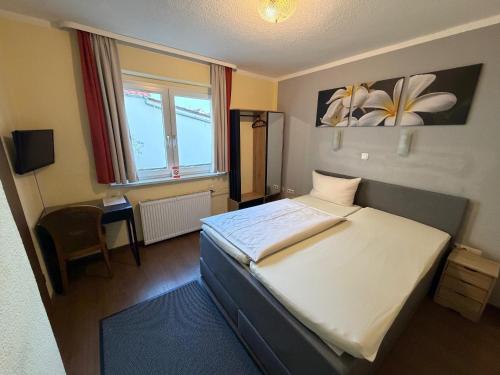 Llit o llits en una habitació de Hotel Sieme