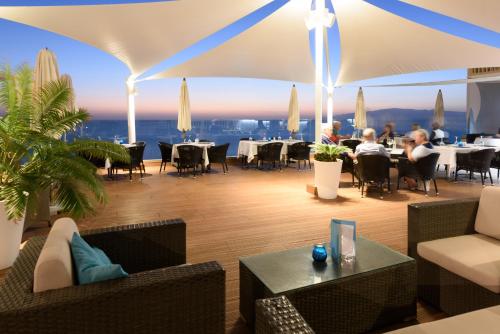 Restoran atau tempat makan lain di Pearly Grey Ocean Club Apartments & Suites