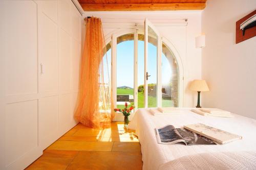 Ένα ή περισσότερα κρεβάτια σε δωμάτιο στο Heliades Villas