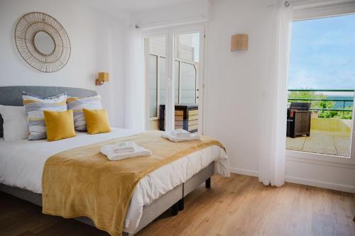 Antarès - Hyper-centre, vue bassin, 108 m2, 3 chambres, clim, parking, plage à 100 m