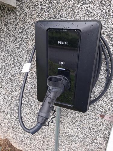 a vesitt camera is plugged into a box at Aittamajotus casinonsaari in Savonlinna
