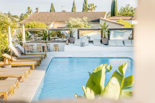 an image of a pool at a house with a resort at Auberge TAO in Biot