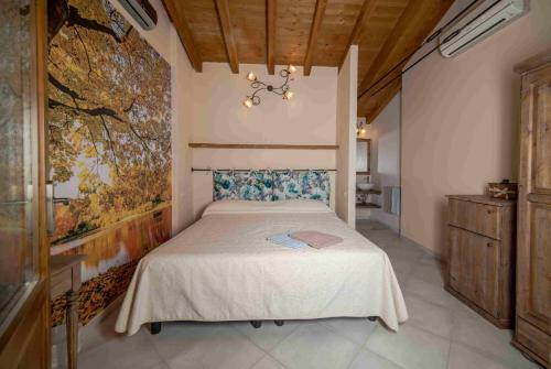 Letto o letti in una camera di Agriturismo La Boschina