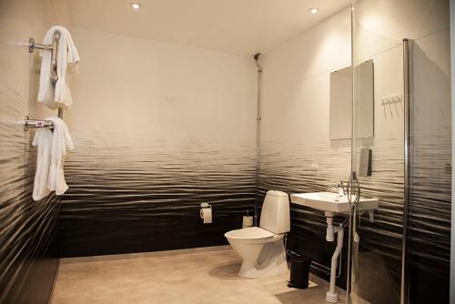 Koupelna v ubytování Hotell TunaPark
