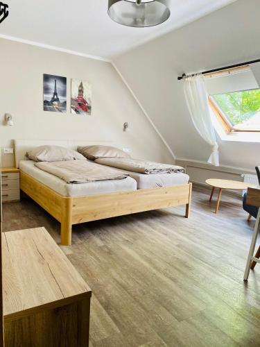 a bedroom with two beds in a room at Wöllbacher Tor in Wetzlar