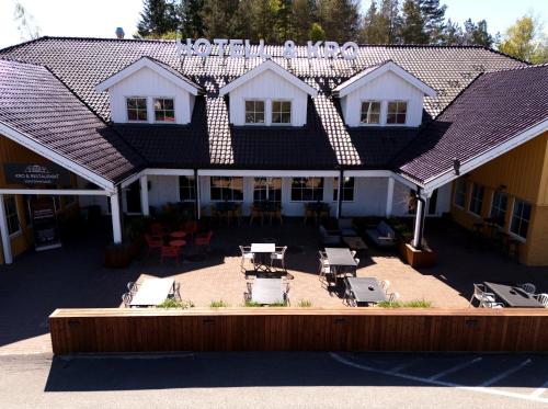 an aerial view of a house with chairs and tables at Storebaug Hotell & Kro in Moss