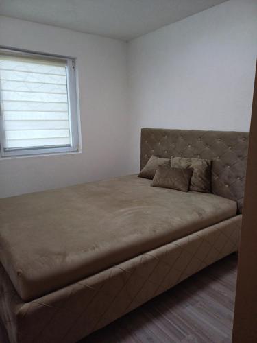 เตียงในห้องที่ Vikend Hangover