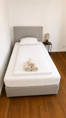 a bed with two rings on top of it at Nürnberg Central Flat in Nuremberg