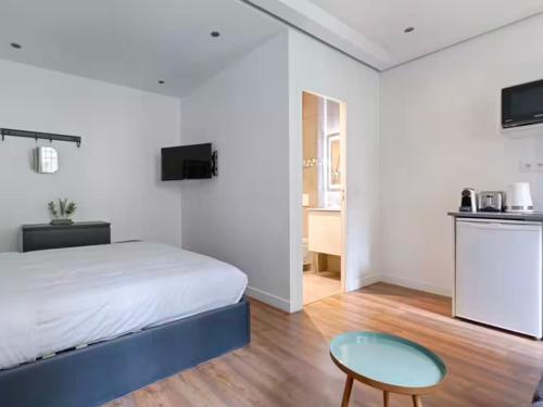UrbanFlat 202 - Studio confortable pour 4 au centre de Paris