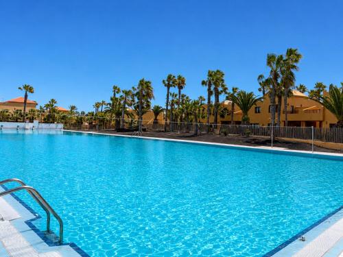 Home2Book Breezy Palm View Duplex with Pool
