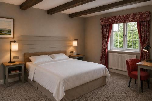 a bedroom with a large bed and a window at Marston Farm Hotel in Sutton Coldfield