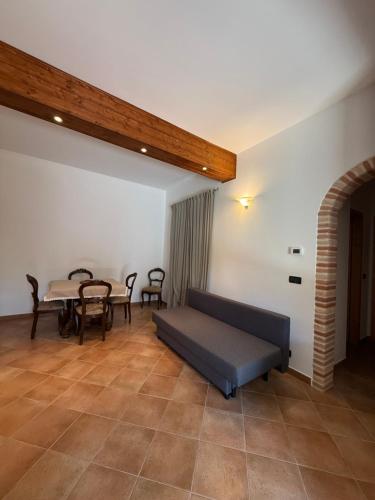 a living room with a couch and a table at Casa Ninni in Casalino