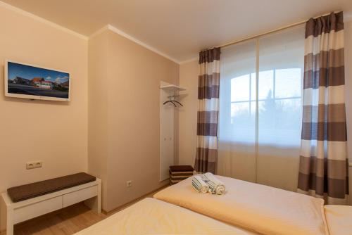 Ένα ή περισσότερα κρεβάτια σε δωμάτιο στο Hotel -Winterfelder Hof