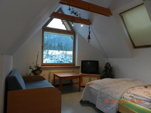 Ліжко або ліжка в номері Apartamencik z Widokiem Na Giewont