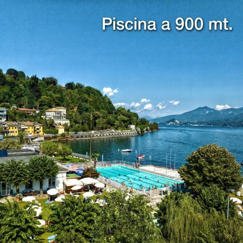 a view of a body of water with a pool at Sinfonia Tintoretto Central 2-Room-Flat in Verbania