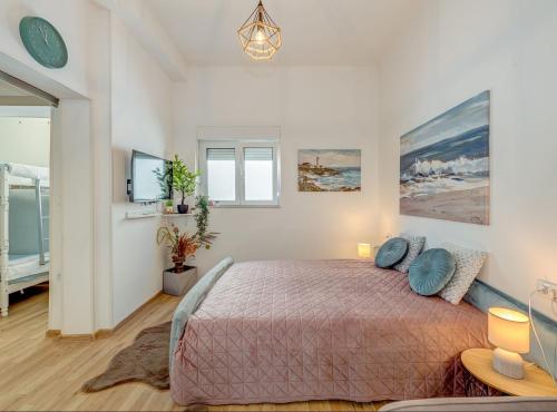 a bedroom with a large bed in a room at Apartment Matoš in Omiš