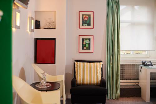 Posezení v ubytování RomanticHOTEL Goldener Karpfen