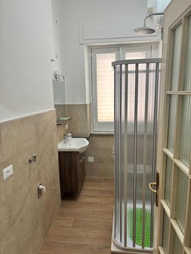 a bathroom with a shower and a sink at Antica dimora Cauto in Pietramelara