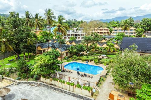 an aerial view of a resort with a swimming pool at Mozza Beach Resort in York