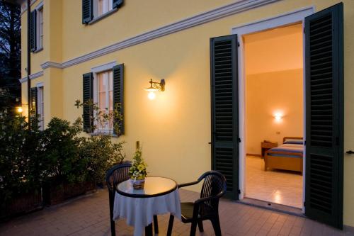 Postel nebo postele na pokoji v ubytování Albergo Ristorante Grigna