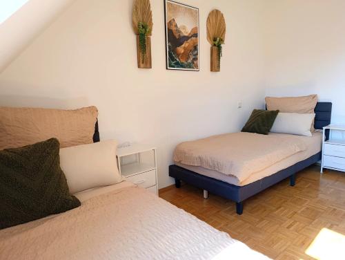 En eller flere senge i et værelse på Suite 13 Old Town
