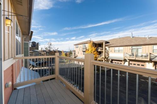 a balcony with a railing on a house at Timbers 9-4 in Fraser