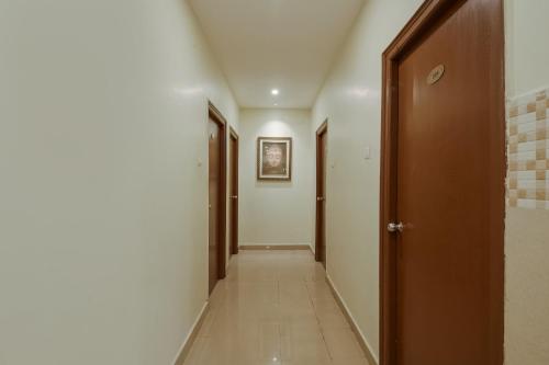 a corridor of a hallway with at Hotel O Anu Grand in Visakhapatnam