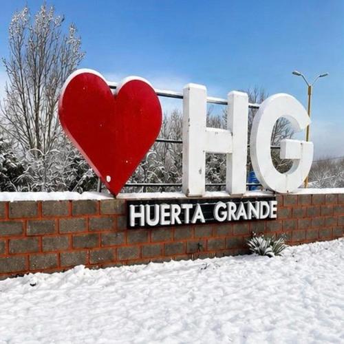 a sign for a hiriba grande in the snow at Casablanca in Huerta Grande