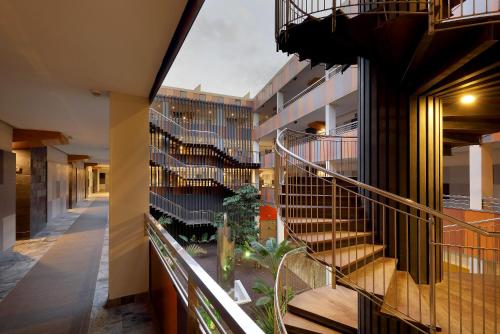 an external view of a building with a spiral staircase at Eurostars Las Salinas in Caleta De Fuste