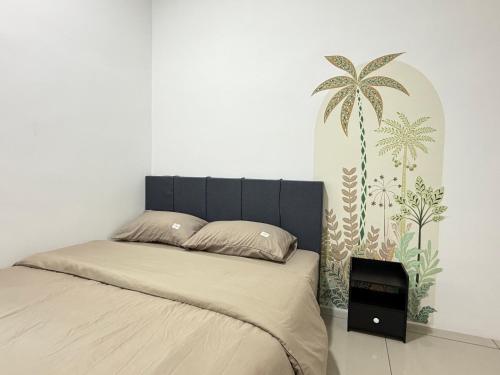 a bedroom with a bed and a palm tree mural at 4B 3R Cozy Spacious Near Dewan Millenium Fully Aircond in Kepala Batas